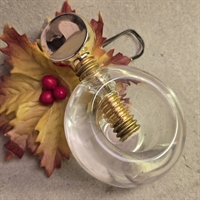 klar-plexi-nøddeknækker-guldfarvet-håndtag-retro-dansk